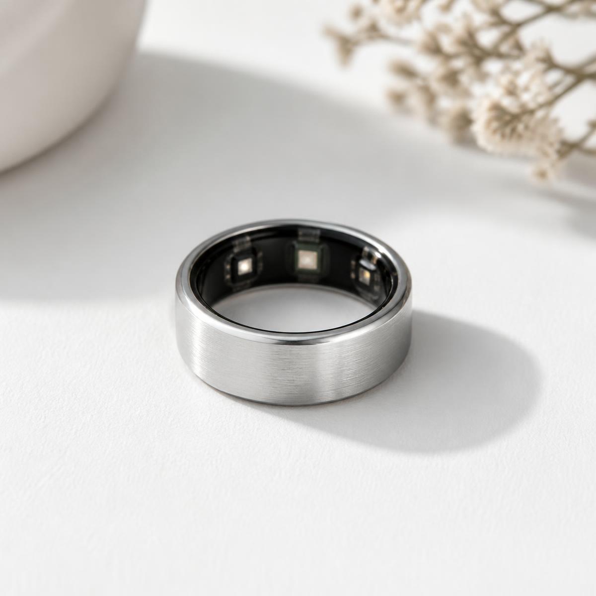 Close-up of the silver Smart Ring and its built-in sensors